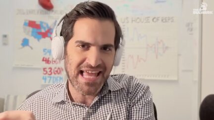 Harry Enten with white headphones on, in podcast appearance
