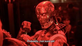 close up of humanoid robot from rek in a fighting pose with a red light on it
